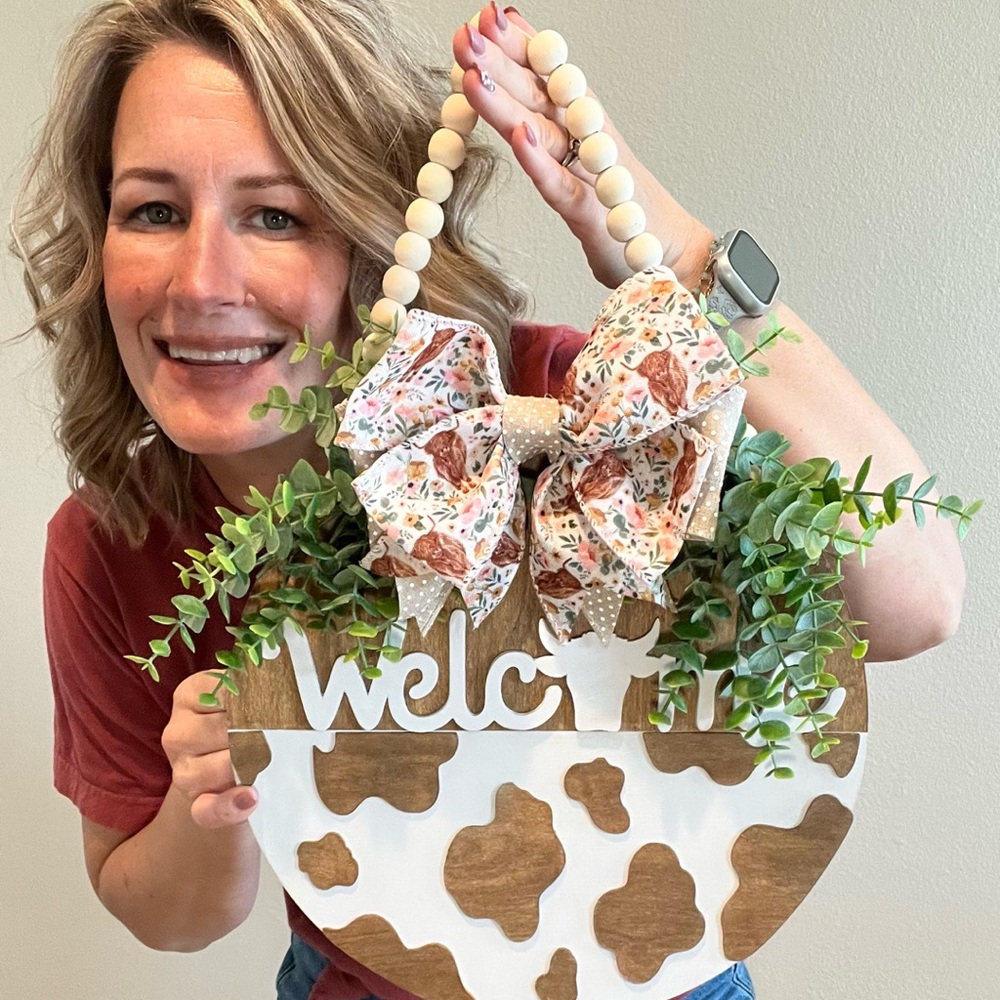 Rustic Welcome Sign with Bow and Greenery